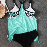 Agosto - Tankini em cor sólida com estampado de panteras