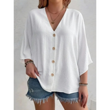 Dorothy™ | Top elegante com decote em V e botões
