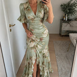 Lucía | Vestido longo assimétrico de cetim com estampado floral