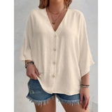 Dorothy™ | Top elegante com decote em V e botões