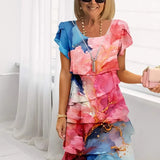 Adèle – Vestido de elegância fluida com volantes