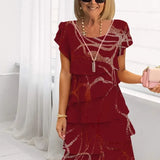 Lucie – Vestido elegante fluido com volantes