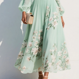 Cisella | Vestido midi em verde claro com padrão floral