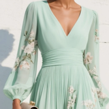 Cisella | Vestido midi em verde claro com padrão floral