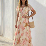 Margaux | Vestido maxi floral de mangas curtas em V
