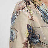 Caroline | Robe maxi portefeuille a flores com mangas três-quartos