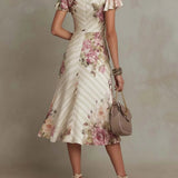 Vestido midi de cetim com padrão floral, elegante e de estilo retro