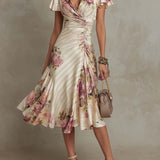 Vestido midi de cetim com padrão floral, elegante e de estilo retro